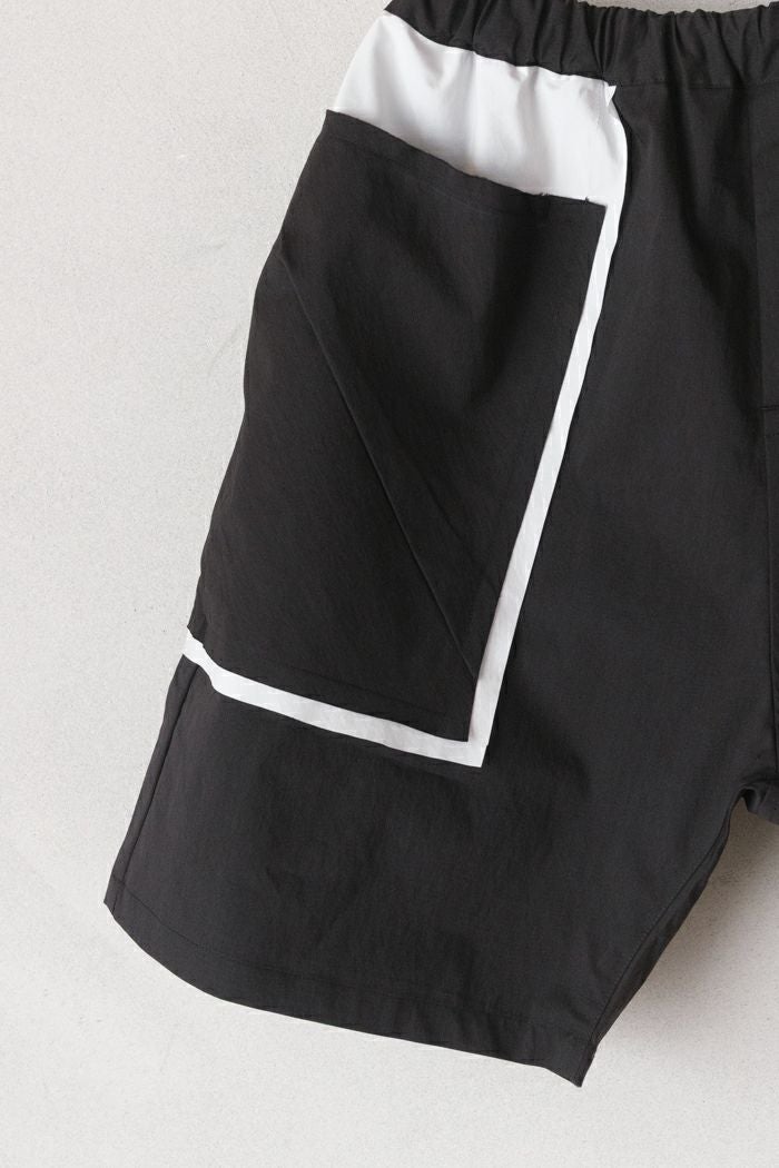nunuforme ヌヌフォルム バイカラーショートパンツ(26SS) | T.T. GARRET
